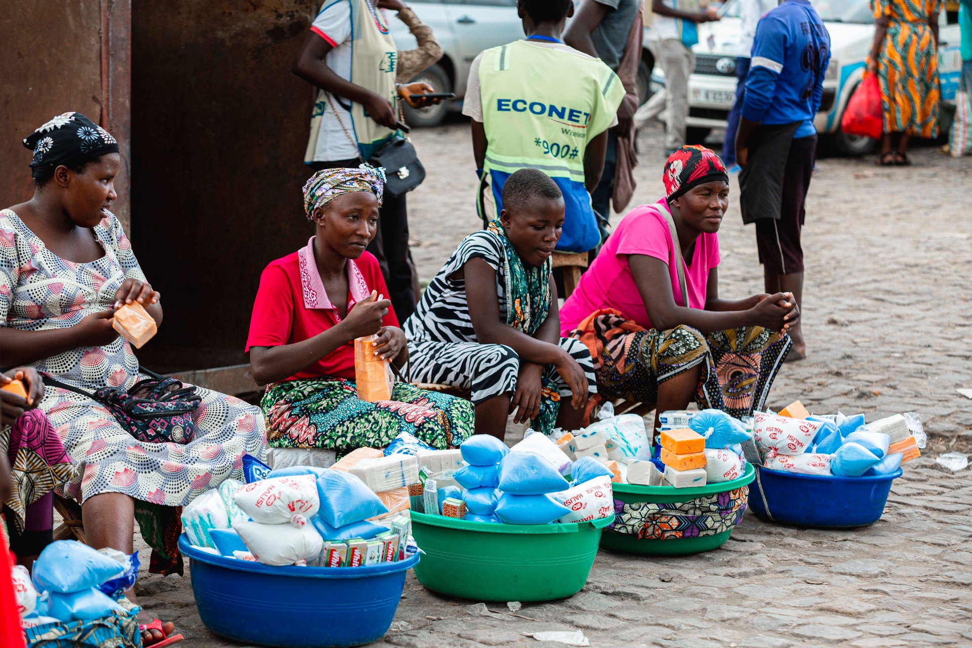 Group of women street traders selling household goods